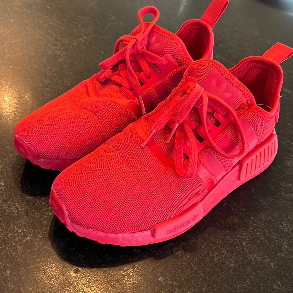 Adidas NMD R1
The adidas NMD R1 "Lush Red"